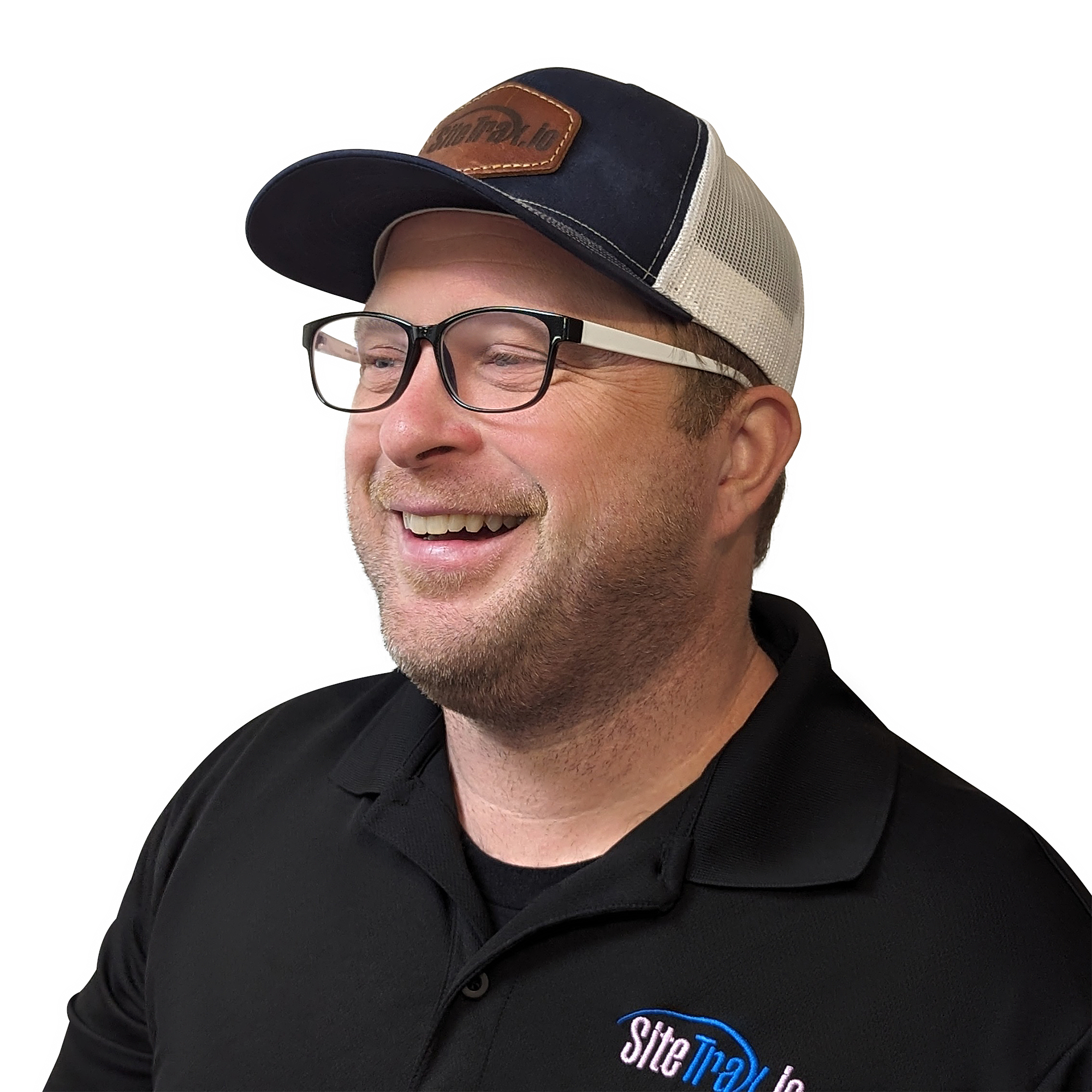 Chris Machut, computer engineer, serial founder, and CEO of SiteTrax.io, laughing in a SiteTrax cap — Virginia Beach, Virginia