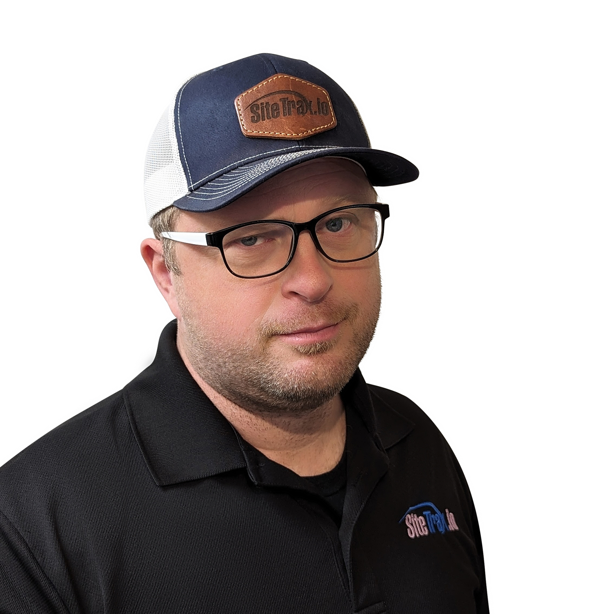 Chris Machut giving a skeptical sideways look in a SiteTrax cap