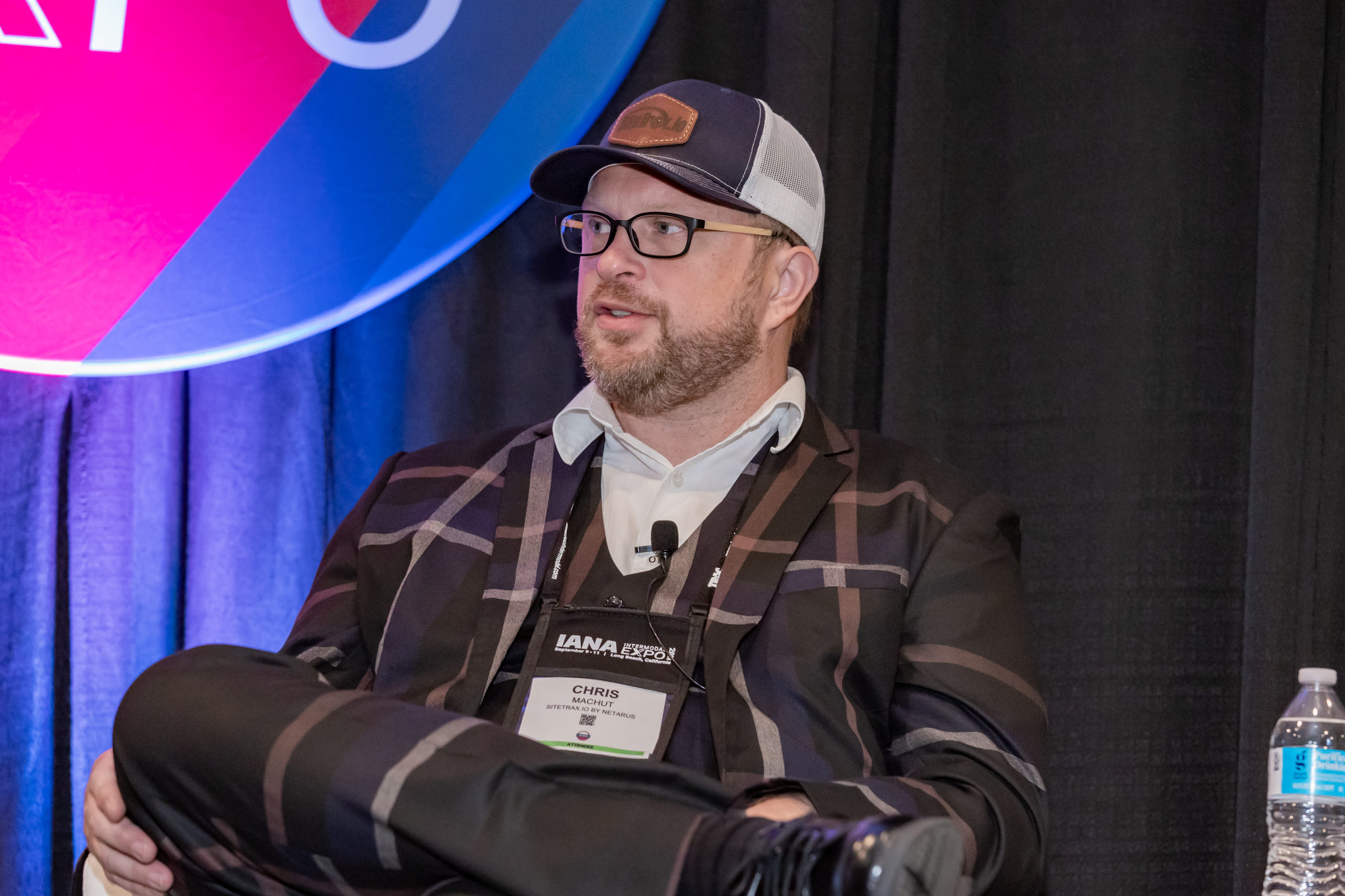 Chris Machut presenting at an AI and supply chain conference